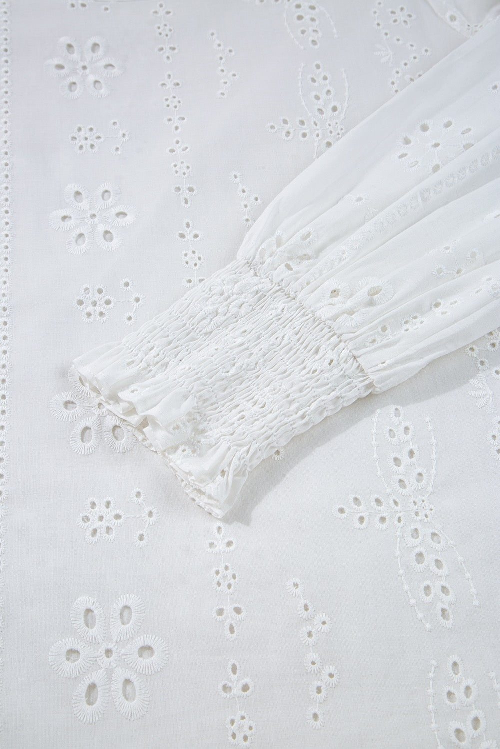 White Eyelet Embroidered Smocked Cuff Blouse