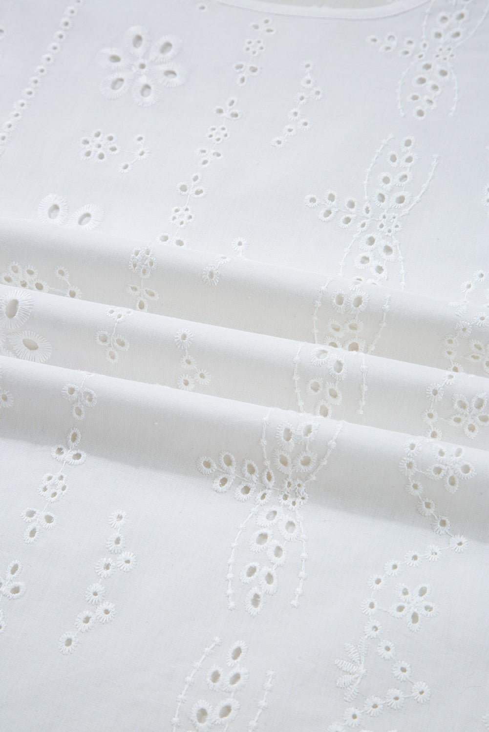 White Eyelet Embroidered Smocked Cuff Blouse