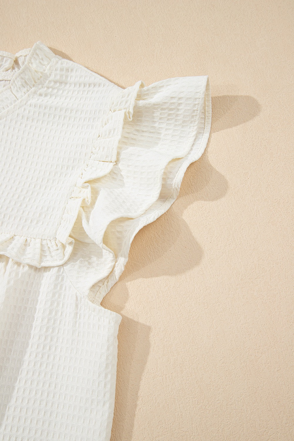 White Ruffle Trim Waffle Knit Blouse