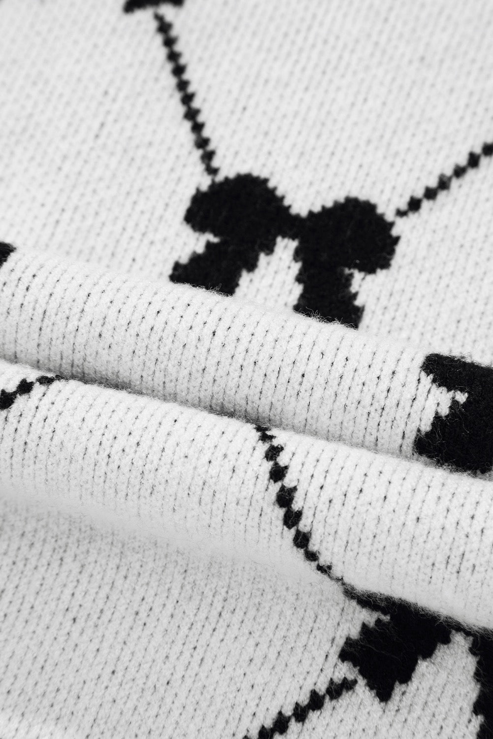 White Sweater with Black Bows
