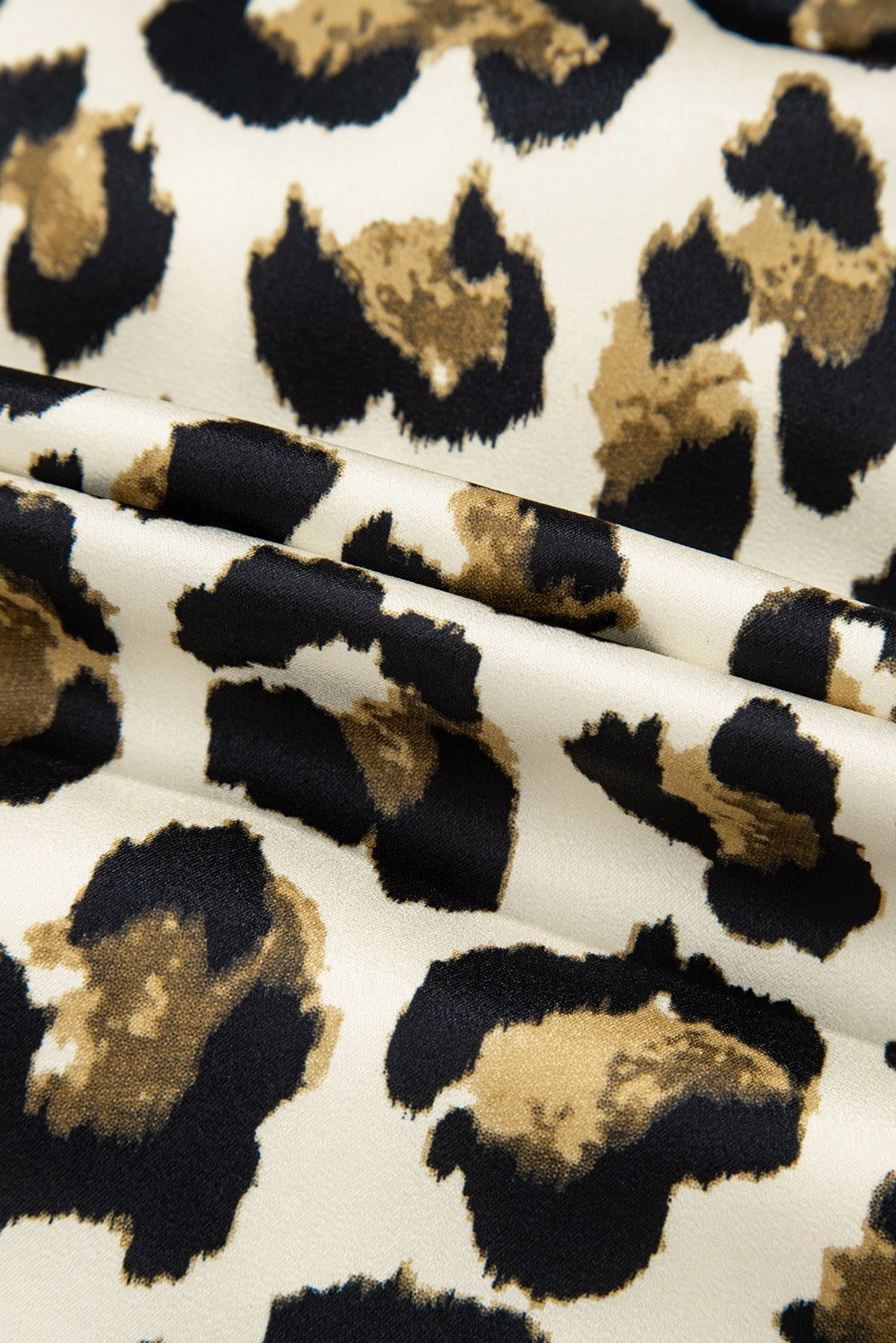 Leopard Tie Front Peplum Top